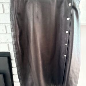 Leather lambskin midi skirt with side snaps closure